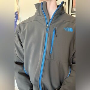 The North Face Men's Gray Jacket with Blue Accents